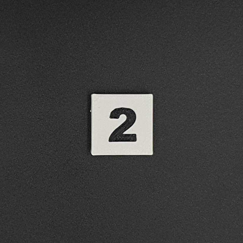 Kostička se symbolem - Symboly: P