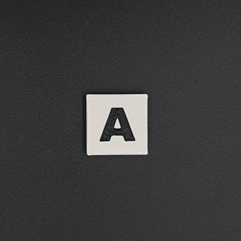 Kostička se symbolem - Symboly: P