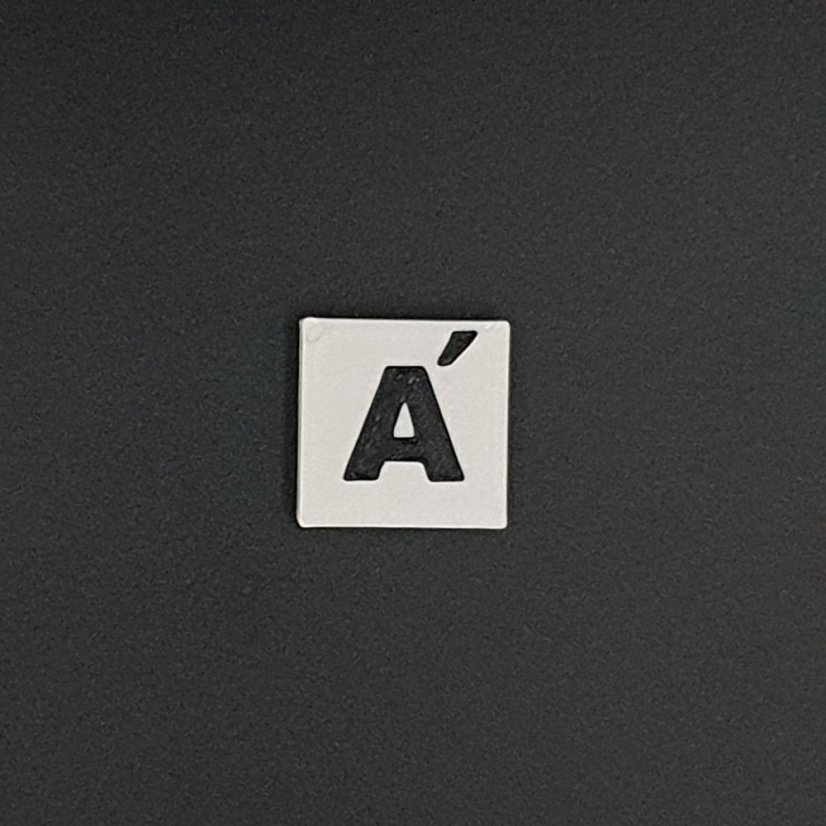 Kostička se symbolem - Symboly: P