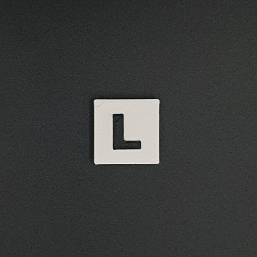 Kostička se symbolem - Symboly: P